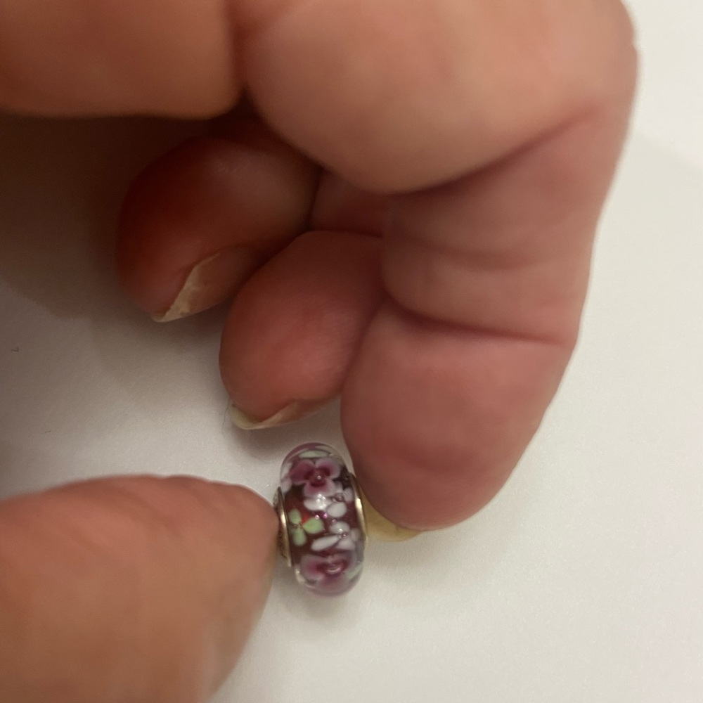 Beautiful Pandora charm with shades of rose and  blue flowers